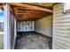 Unfinished storage shed with wood framing and exposed ceiling beams at 1529 Bailey Dr, Indianapolis, IN 46241