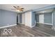 Inviting living room featuring new floors and multiple closets for storage at 1807 Dayton Ave, Indianapolis, IN 46203