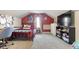 Cozy bedroom with a comfy bed and a large television at 23 Greenacre Dr, Brownsburg, IN 46112