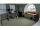 Bonus room with an elliptical machine and a weight lifting station at 3615 E State Rd 32, Lebanon, IN 46052