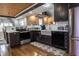 Updated kitchen with stainless steel appliances, dark cabinetry, and a stylish backsplash creating a contemporary culinary space at 3615 E State Rd 32, Lebanon, IN 46052