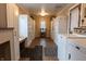 Laundry room with washer, dryer, tile floors, utility sink and plenty of storage cabinets for cleaning supplies at 3615 E State Rd 32, Lebanon, IN 46052