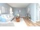 Cozy living room with stylish furniture, bright accents, and hardwood flooring at 3723 N Olney St, Indianapolis, IN 46218