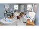 Inviting living room featuring stylish furnishings, ample natural light, and hardwood floors at 3723 N Olney St, Indianapolis, IN 46218