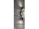 This exterior features a modern light fixture at 4242 Winthrop Ave, Indianapolis, IN 46205
