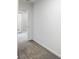 Hallway featuring a neutral color palette and new carpeting at 4242 Winthrop Ave, Indianapolis, IN 46205