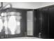 This kitchen features modern dark cabinets and sleek hardware at 4242 Winthrop Ave, Indianapolis, IN 46205