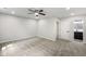Spacious bedroom with plush carpet, ensuite bathroom, and ceiling fan at 4242 Winthrop Ave, Indianapolis, IN 46205