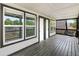 Long patio area with multiple windows and doors provides natural light at 4242 Winthrop Ave, Indianapolis, IN 46205