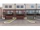 Exterior view of townhomes featuring private balconies and garage parking at 440 S Meridian Unit A-Bldg D St, Greenwood, IN 46142