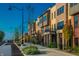Charming street view showcasing modern townhomes with manicured landscaping and inviting curb appeal at 440 S Meridian Unit A-Bldg D St, Greenwood, IN 46142