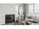 Living room featuring a fireplace, accent chair, and modern decor at 444 S Meridian Unit B-Bldg D St, Greenwood, IN 46142
