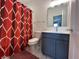 Bathroom featuring shower and tub with vanity and updated fixtures at 50 Hovden Dr, Cicero, IN 46034