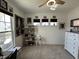Inviting bedroom with neutral carpet, natural light, and ample closet space at 50 Hovden Dr, Cicero, IN 46034