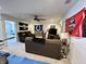 Spacious living room with comfortable seating and a large television, perfect for entertaining at 50 Hovden Dr, Cicero, IN 46034