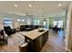 Open concept living and dining areas featuring hardwood floors and plenty of natural light at 50 Hovden Dr, Cicero, IN 46034