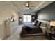 Comfortable bedroom featuring a tray ceiling, neutral carpet, and a relaxing color palette at 50 Hovden Dr, Cicero, IN 46034