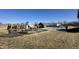 Community playground with slides, swings, and climbing wall adjacent to the community pool at 50 Hovden Dr, Cicero, IN 46034