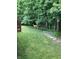 Secluded backyard featuring lush greenery and wildlife, offering a serene and private outdoor space at 504 Stony Creek Cir, Noblesville, IN 46060
