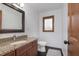 Bathroom featuring a granite countertop sink and sleek toilet at 504 Stony Creek Cir, Noblesville, IN 46060