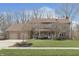Charming two-story home with a well-maintained front lawn and attached two-car garage at 504 Stony Creek Cir, Noblesville, IN 46060