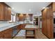 Charming kitchen with granite countertops, wood floors, stainless appliances, and bright natural light at 504 Stony Creek Cir, Noblesville, IN 46060