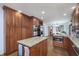 Gourmet kitchen featuring a center island, stainless steel appliances, and custom cabinetry at 504 Stony Creek Cir, Noblesville, IN 46060