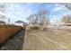 Large backyard with a wood fence between the home and the neighbors at 520 N Parker Ave, Indianapolis, IN 46201