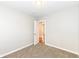 Neutral bedroom featuring carpet and white trim at 520 N Parker Ave, Indianapolis, IN 46201