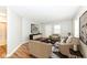 Cozy living room with hardwood floors, neutral tones, and ample natural light at 520 N Parker Ave, Indianapolis, IN 46201