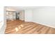 Spacious living room featuring hardwood floors and natural light from a large window at 520 N Parker Ave, Indianapolis, IN 46201