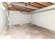 A basement area with concrete walls, exposed ductwork, and low ceilings at 59 E Troy Ave, Indianapolis, IN 46225