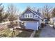 Traditional blue home with well-manicured front yard and inviting curb appeal at 59 E Troy Ave, Indianapolis, IN 46225