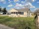 Attractive one-story home with a stone foundation, covered porch, and a cozy, inviting atmosphere at 609 S Grant St, Martinsville, IN 46151