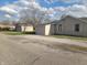 View of home with detached garage, great space to park vehicle or storage space at 609 S Grant St, Martinsville, IN 46151