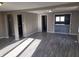 Spacious living room with hardwood floors and neutral paint at 609 S Grant St, Martinsville, IN 46151