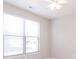 Bedroom featuring a large window and a ceiling fan with light at 6117 Arctic Cir, Indianapolis, IN 46237