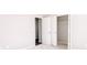 Open double door closet with white shelving and carpeted floor at 6117 Arctic Cir, Indianapolis, IN 46237