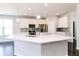 Large kitchen with stainless steel appliances, lots of cabinets and a large island with sink at 6117 Arctic Cir, Indianapolis, IN 46237