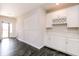 A living room with cabinets and modern flooring at 6117 Arctic Cir, Indianapolis, IN 46237