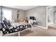 Comfortable bedroom with neutral tones, a work desk, and a calming atmosphere at 6126 Golden Eagle Dr, Zionsville, IN 46077