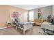 Charming bedroom featuring soft colors, stylish decor, and a cozy seating area for relaxation at 6126 Golden Eagle Dr, Zionsville, IN 46077