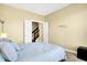 Cozy bedroom with an entry to the hallway and a large window at 6126 Golden Eagle Dr, Zionsville, IN 46077