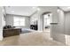 Inviting bonus room with vaulted ceilings, plush seating, and ample natural light at 6126 Golden Eagle Dr, Zionsville, IN 46077