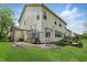 View of the home's rear exterior features a play area and outdoor patio space at 6126 Golden Eagle Dr, Zionsville, IN 46077