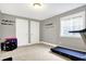 Home gym with weights, yoga mat and a treadmill at 6126 Golden Eagle Dr, Zionsville, IN 46077