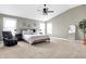 Spacious main bedroom with vaulted ceiling, ample natural light and cozy decor at 6126 Golden Eagle Dr, Zionsville, IN 46077