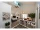 Open-concept living room boasts vaulted ceilings, fireplace, and seamless flow to the dining area for entertaining at 615 Conner Creek Dr, Fishers, IN 46038
