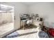 Bright office area near sliding glass door featuring modern desk and neutral decor at 615 Conner Creek Dr, Fishers, IN 46038