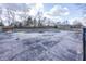 Outdoor pool with a safety cover surrounded by a concrete patio and a fence at 615 Conner Creek Dr, Fishers, IN 46038